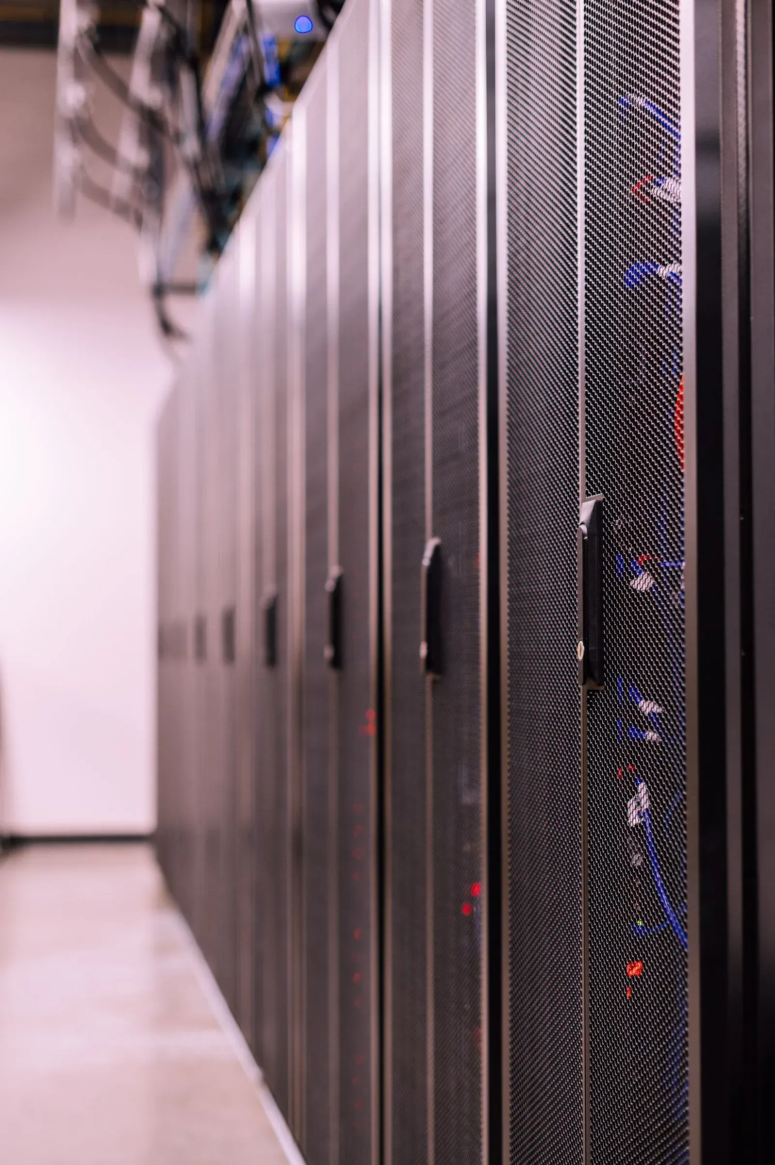 Rows of servers humming in a data centre, the building behind every instant answer.