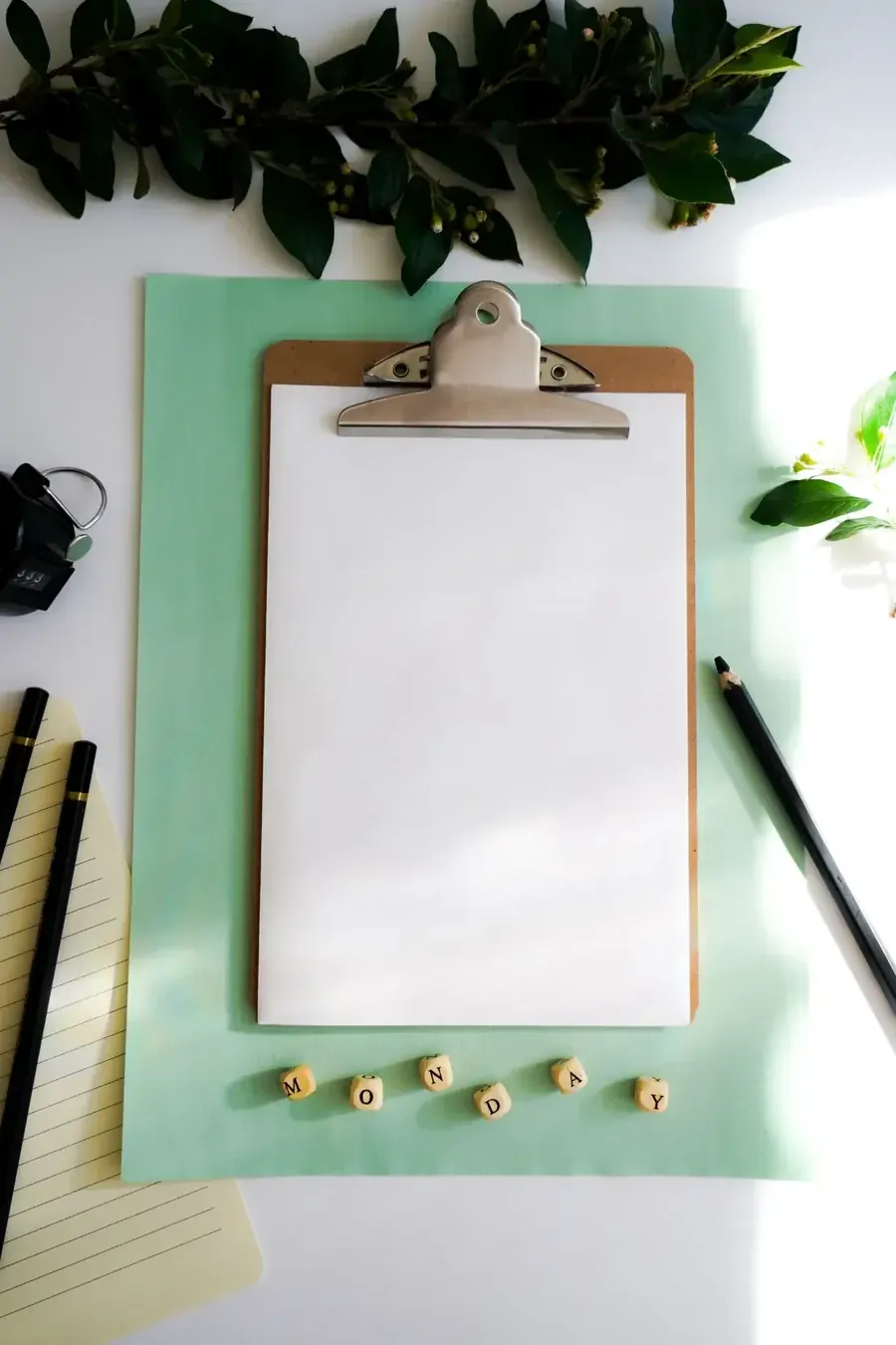 MONDAY spelled out under a blank page, a week that has not asked anything of her yet.