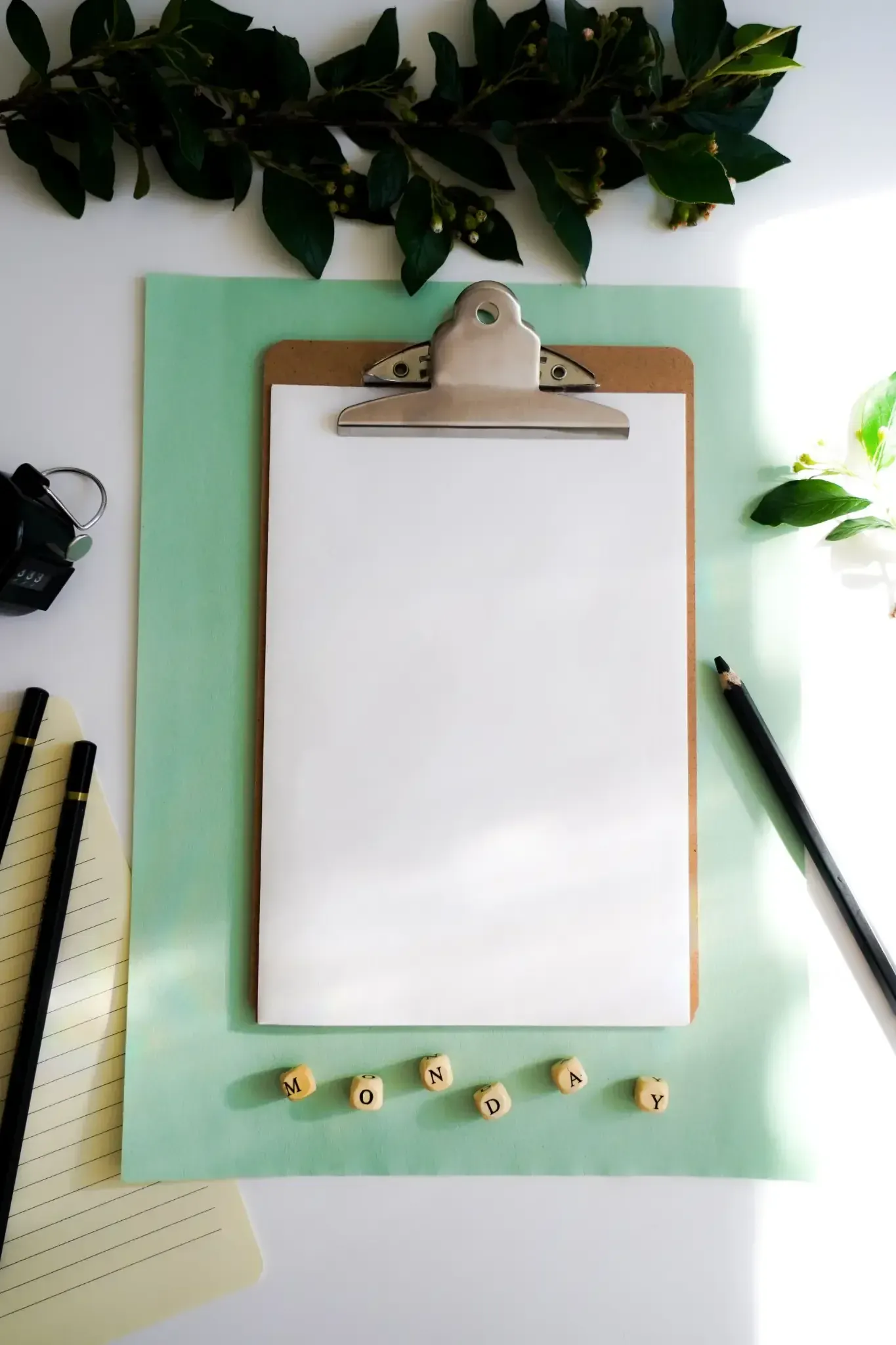 MONDAY spelled out under a blank page, a week that has not asked anything of her yet.